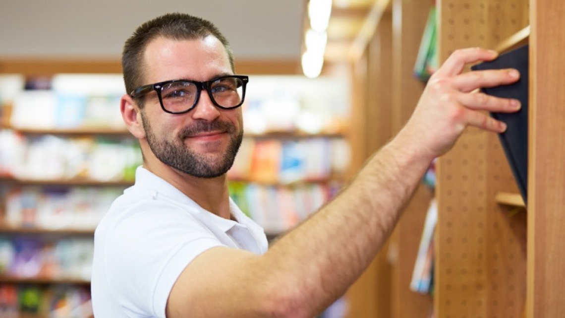 Graduate student takes out research book from public library 