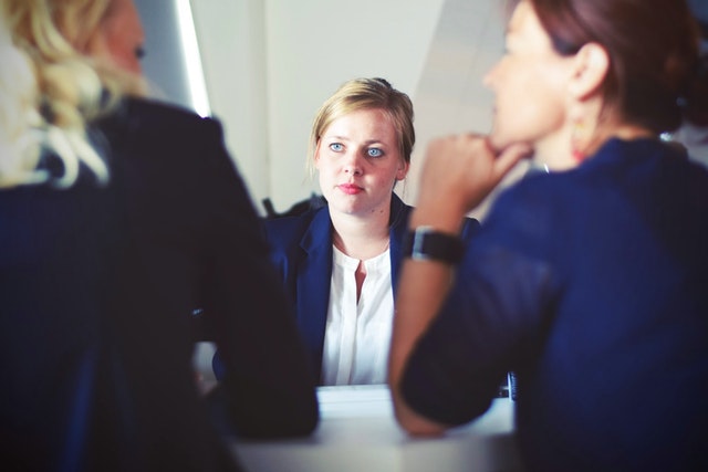 Two female academics interview a potential female candidate